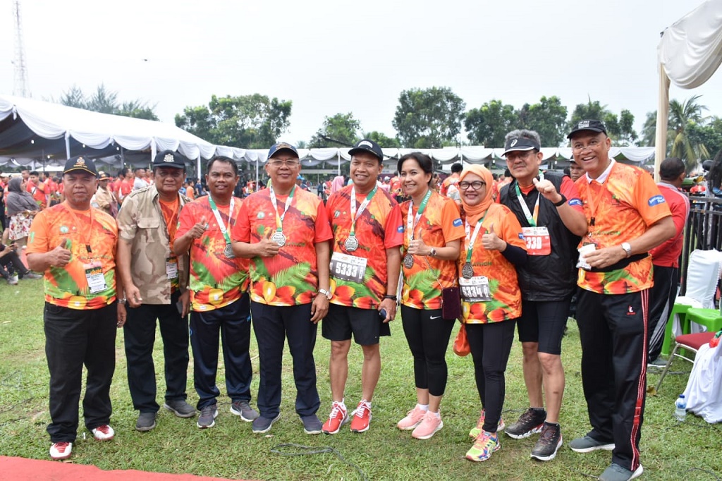 Dihadiri Ribuan Peserta, Bupati dan Wabup Sergai Turut Dalam Oil Palm Marathon 2019